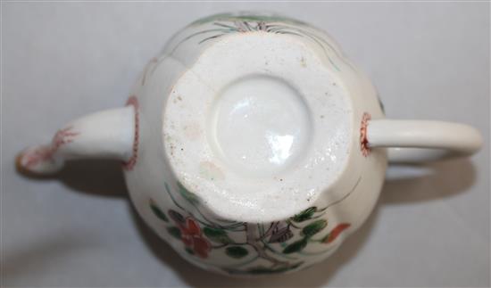 A rare Arita quatre-lobed small teapot and cover, late 17th century, 8.2cm, firing crack to body